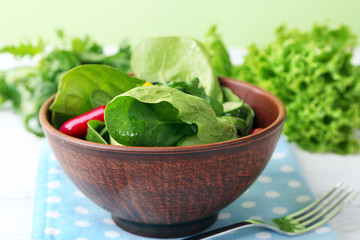 fresh vegetable salad in bowl on table close up
