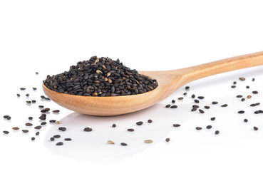 sesame in the spoon on white background