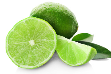 Fototapeta na wymiar Sliced fresh limes isolated on white