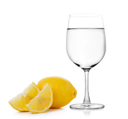 water with lemon on white background