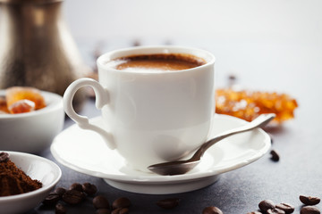 Fresh croissants  and cup of coffee on a table