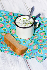 Okroshka. Russian summer soup and rye bread