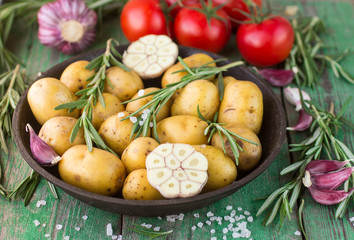 Potatoes for roasting with rosemary  and  garlic
