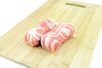 Dutch meat roll called "Slavink" made of ground beef with bacon wrapped on the outside