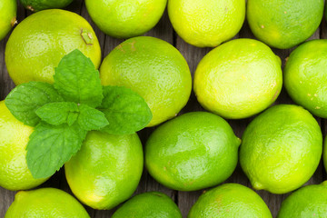 Fresh ripe limes with mint