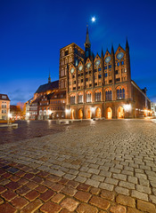 Fototapeta na wymiar Old Town Hall and St. Nicolas Church in the evening, Stralsund