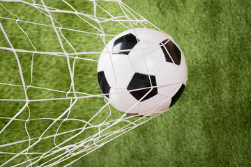 Fototapeta na wymiar Soccer Ball In Net