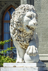 Marble sculpture of lion with ball in Vorontsov Palace in Alupka