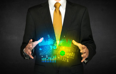 Businessman holding diagram cloud