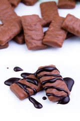 Chocolate candies on a white background.