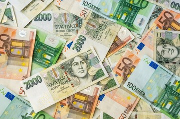 Obraz na płótnie Canvas Czech and Euro banknotes background