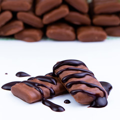 Chocolate candies on a white background.