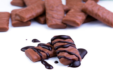 Chocolate candies on a white background.
