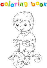 Small cute boy riding a bicycle