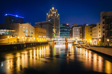 Buildings along the Milwaukee River at night, in Milwaukee, Wisc