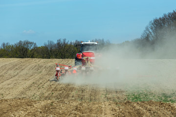 Naklejka premium Sowing the corn