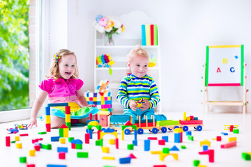Kids playing at day care with wooden toys