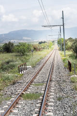 Fototapeta na wymiar railroad tracks pylons countryside