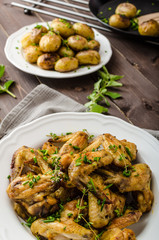 Roasted chicken wings with new potato