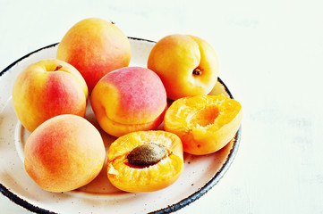 Fresh abricots on white background