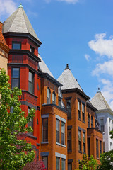 Fototapeta na wymiar Colorful brick townhouse of US capital.