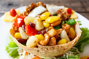 Stir fried chicken with cashew nuts.