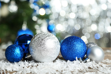 Christmas balls on grey wooden background