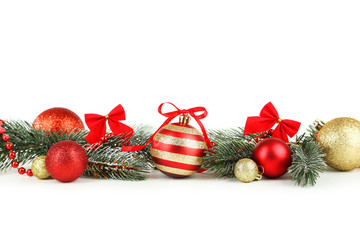 Branch of Christmas tree with balls isolated on white