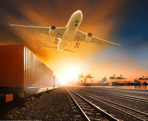 Naklejka premium industry container trainst running on railways track plane cargo