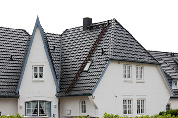 the roof of the house with nice window..