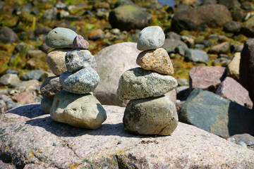 Fototapeta na wymiar Three Stacks of pebble stones