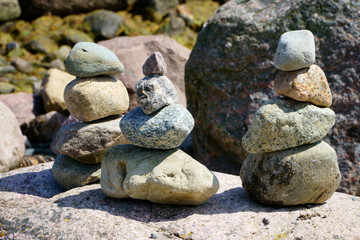 Fototapeta na wymiar Three balanced Stacks of pebble stones