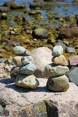 Fototapeta na wymiar Three balanced Stacks of pebble stones