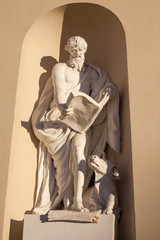Statue on the wall of Vilnius Cathedral