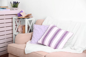 Modern room with comfortable sofa, indoors