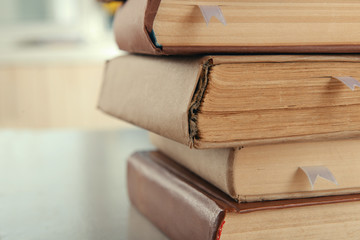 Stack of books on table close up