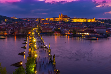 Charles Bridge, Prague Castle, Vltava river in Prague at sunset