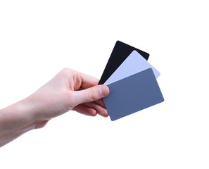 Hand holding White balance Cards Isolated