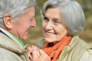  Senior couple in autumn park