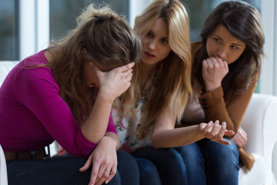 Sad Girl And Supporting Friends