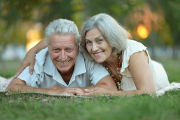 Elderly couple smilling together