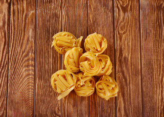 pasta on wooden background with