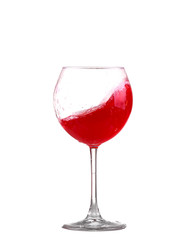 red wine splashing in a glass, isolated on white
