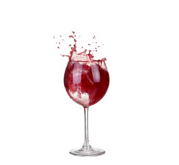 red wine pouring into wine glass isolated on a white background