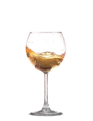 white wine splash before white background