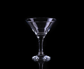 silhouette of martini glass on black background