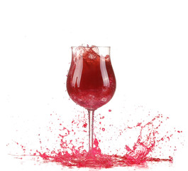 Glass with red wine splash