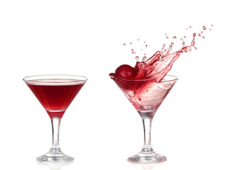 Wine collection - Splashing red wine in a glass. Isolated on whi