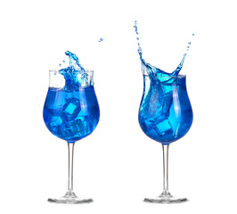 blue cocktail with splashes on white
