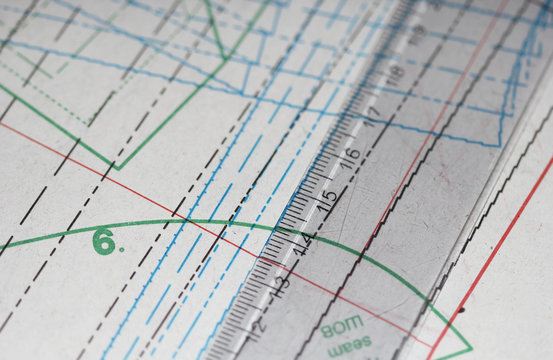 The ruller laying on sewing drawings macro shot